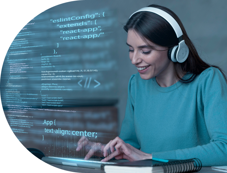 A female IT professional happily working developing programming codes.